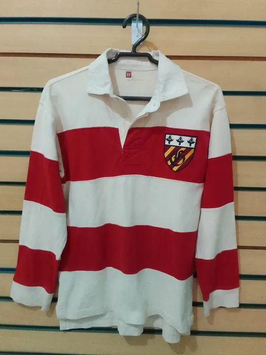 Camiseta Polo listrada Gap Infantil.