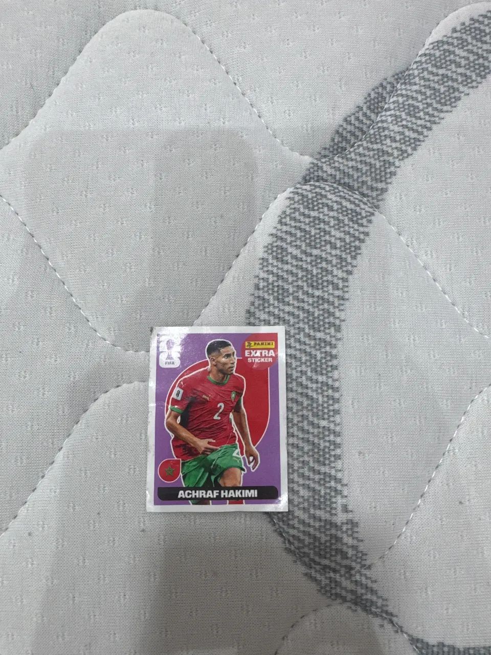 Figurinha da copa imperdível do Achbaf Hakimi Roxa