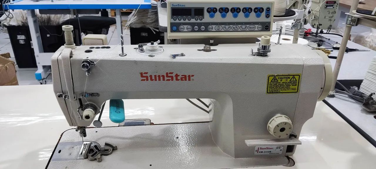 Máquina de costura industrial reta e Pesponto