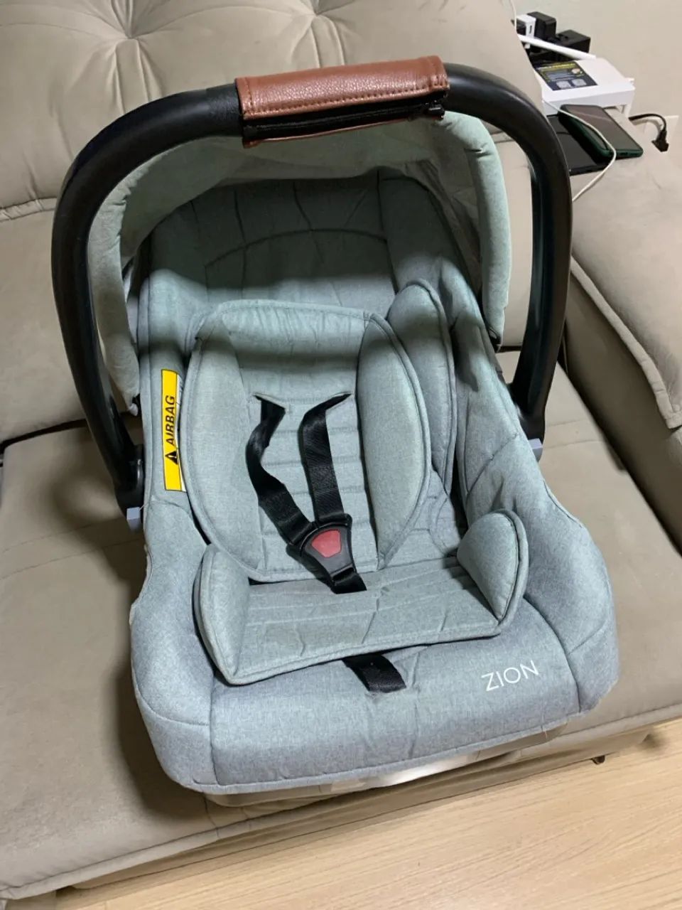 Bebê conforto com suporte 