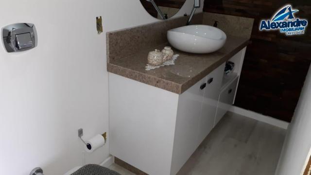 Casa com piscina no centro de guaramirim. - Foto 6