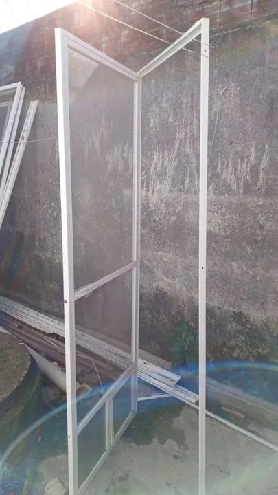 Porta Mosqueteira de alumínio  c/ Tela Poliéster PET  Perfil Branco -0,78x2,10m - Foto 2