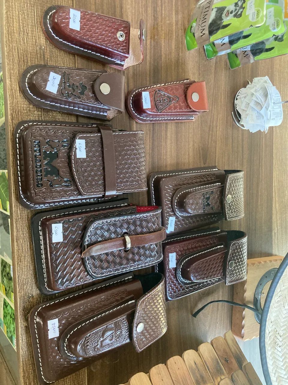 Lote de capinhas de couro e porta canivete 