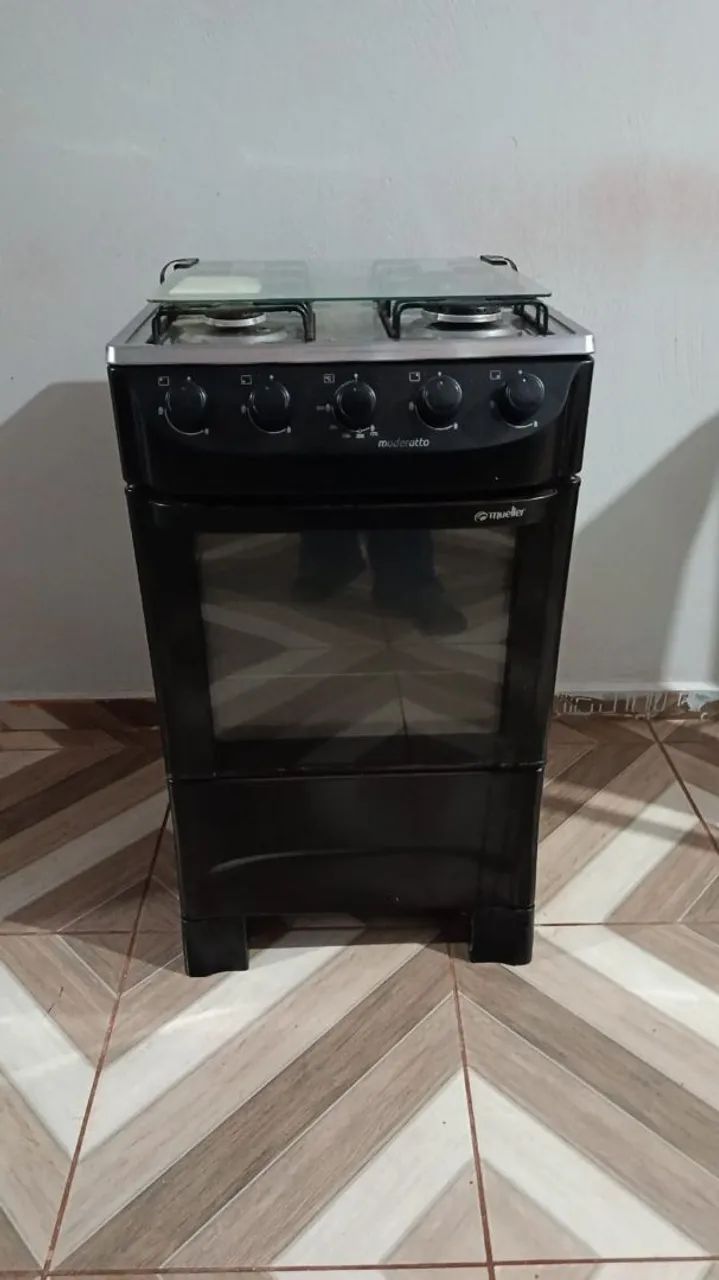 Fogão simples porém completinho 