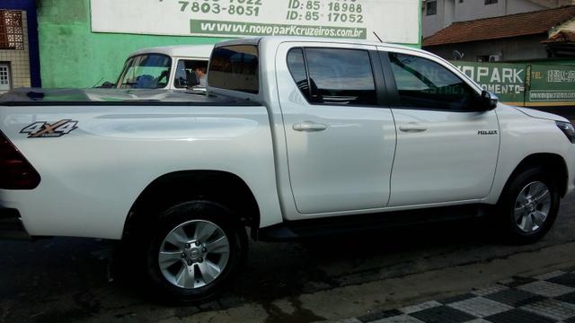 Hilux srv aut DIESEL 2018 zerada !!! - Foto 14
