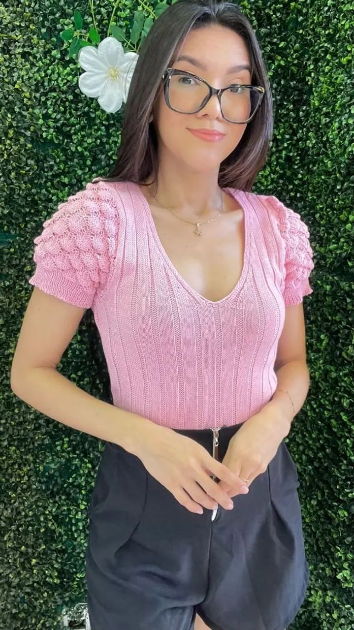 Blusa de tricot rosa com mangas bufantes