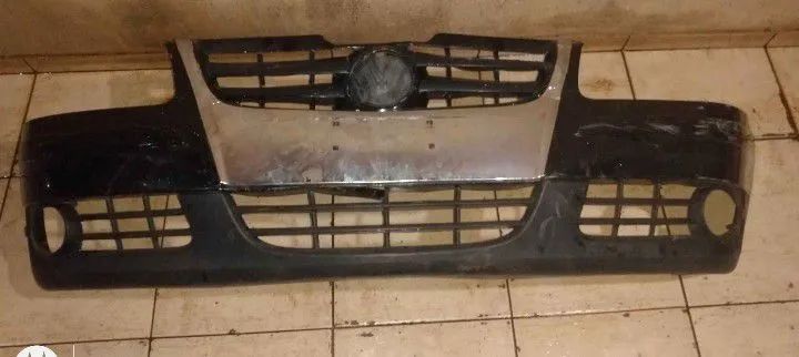 Para choque dianteiro gol g4 original com grade cromada