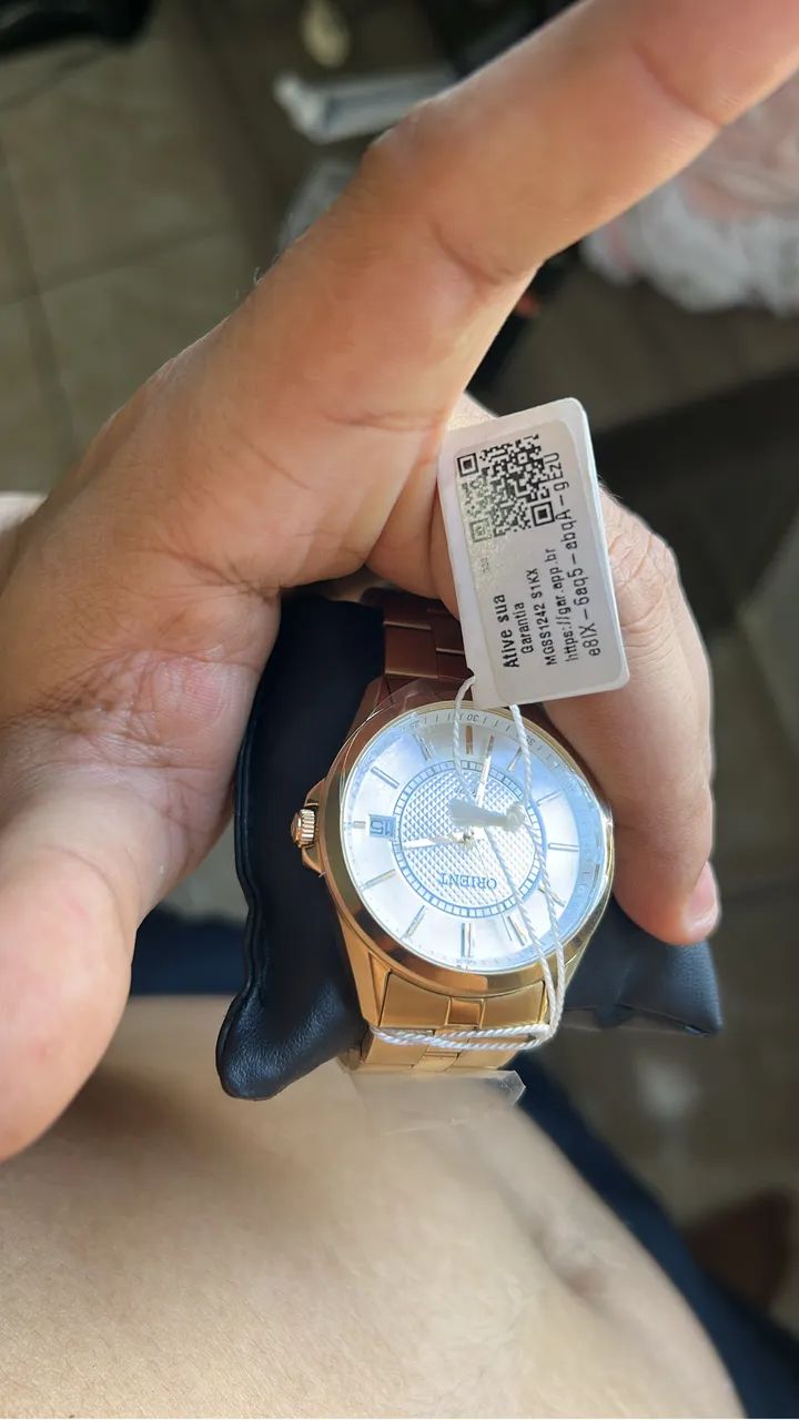 Relógio orient dourado com fundo branco  - Foto 3