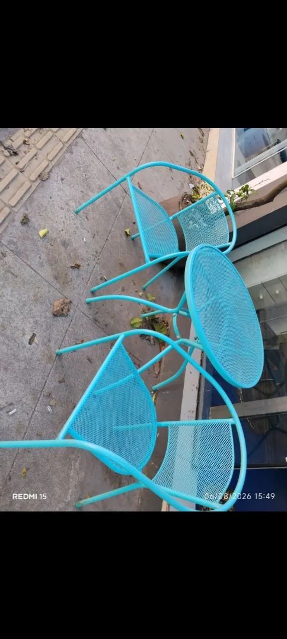 Mesa e cadeiras de jardim varanda