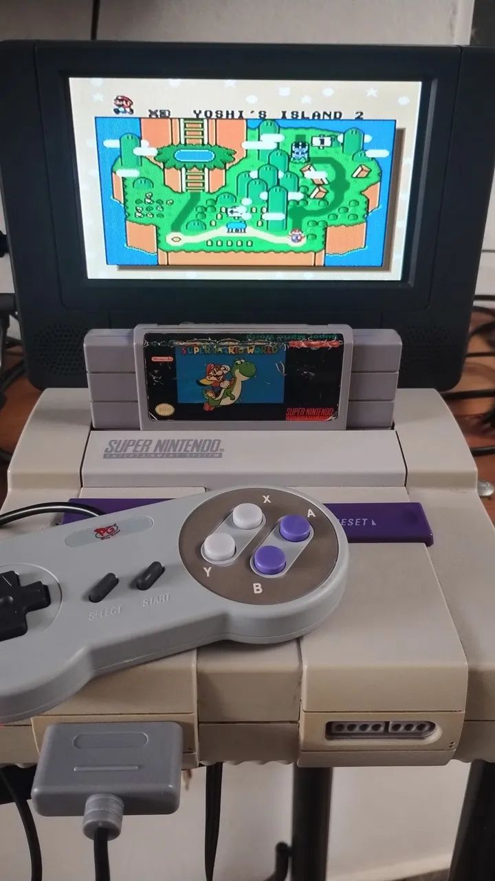 Super Nintendo (SNES) com Super Mario World 