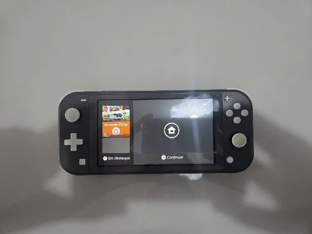 Nintendo Switch Lite Cinza + Caixa + Case Oficial + Carregador - Foto 2