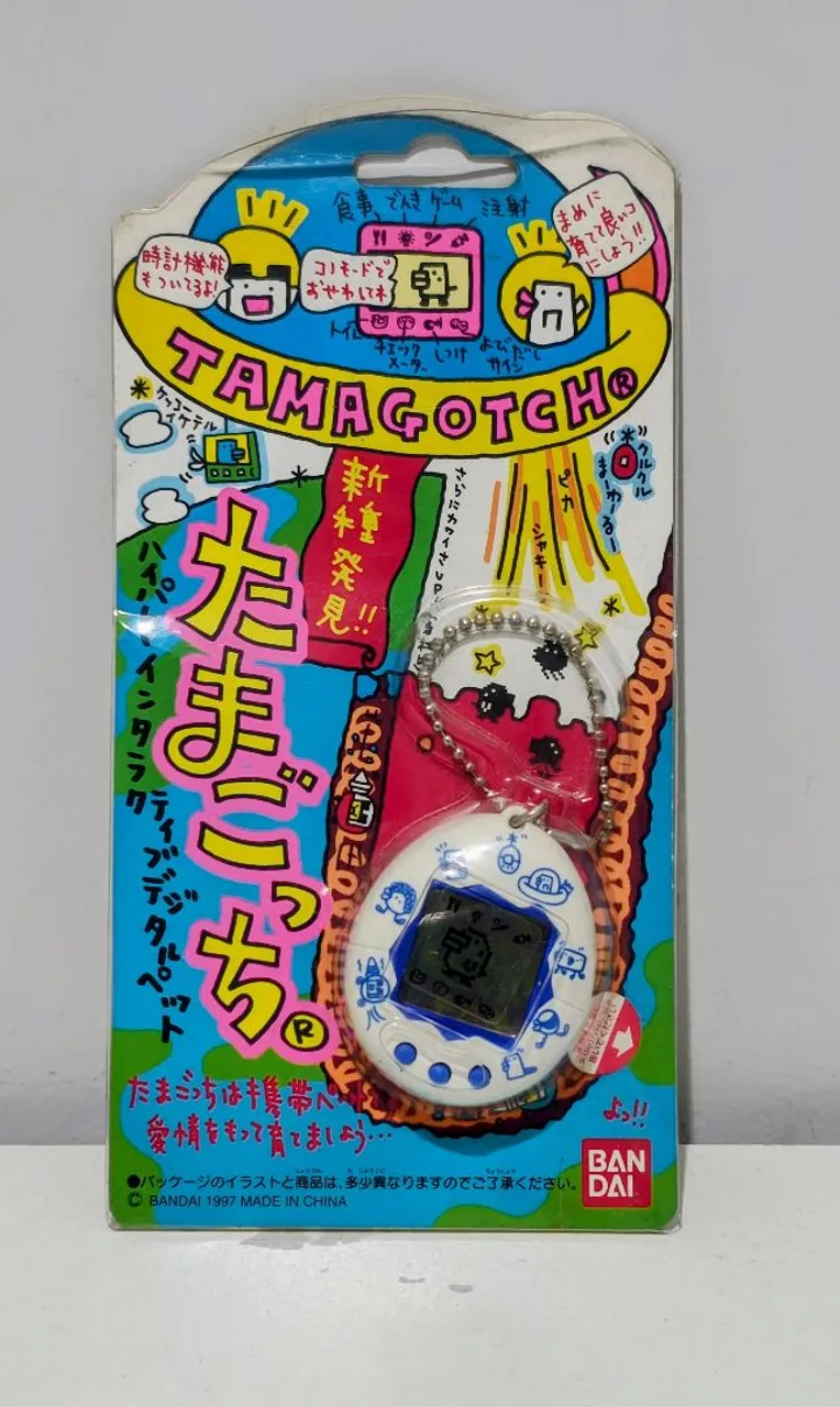 Tamagotchi Uni Purple (Roxo) - Completo na Caixa + Brinde