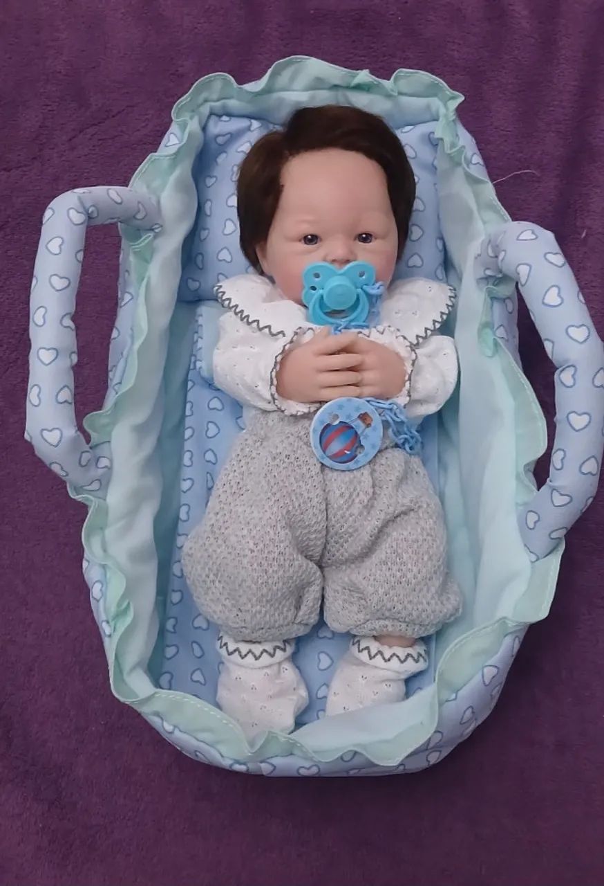 Boneca bebê reborn de silicone sólido menino  - Foto 4