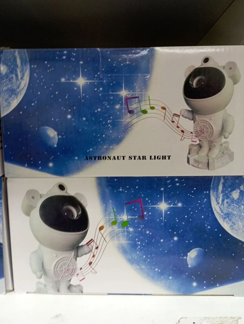 Projetor Astronauta com caixa de som Bluetooth - Luz de Estrela