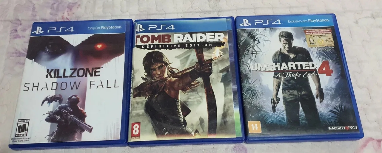 3 Jogos PS4 - Killzone Shadow Fall, Tomb Raider Definitive Edition e Uncharted 4