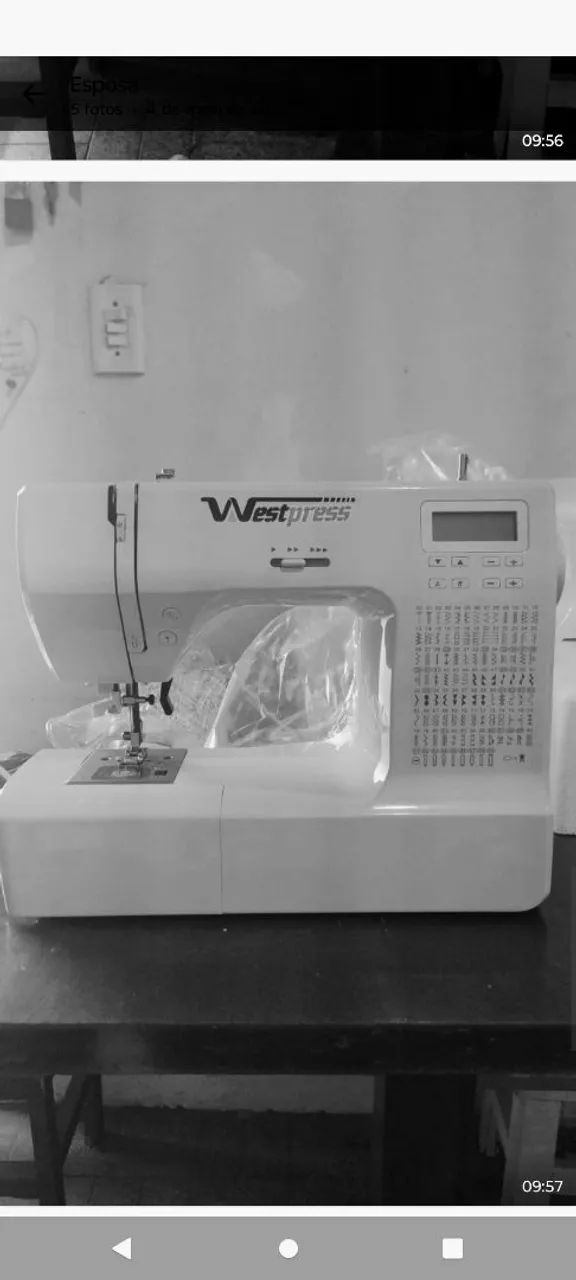 Vendo máquina de costura na caixa de