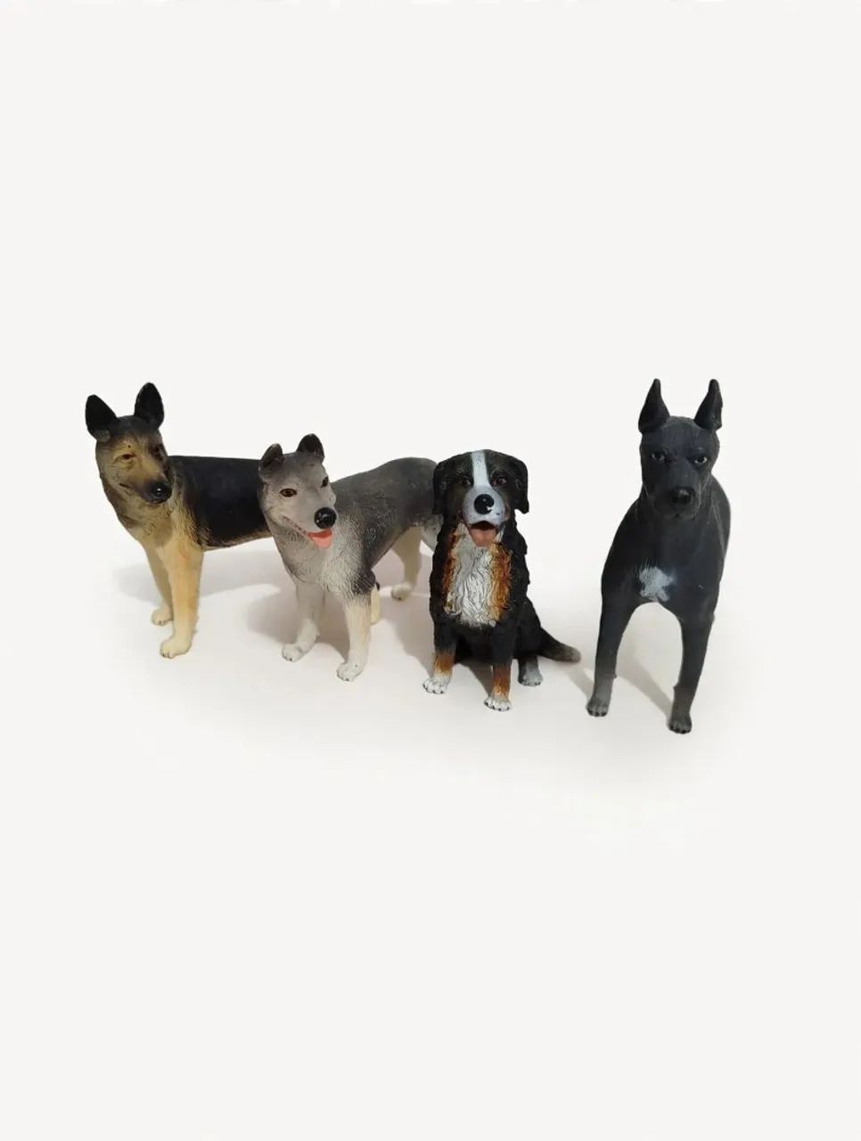 4 miniaturas realistas de cachorros