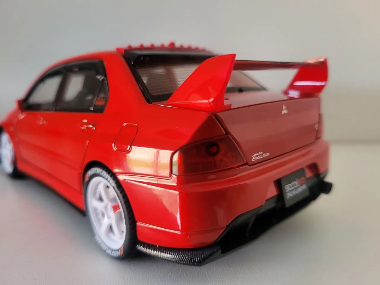 Miniatura Lancer Evolution 1/24, três cores - Foto 5