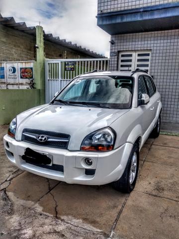 Vendo ou troco tucson automático com GNV banco de couro e multimídia
