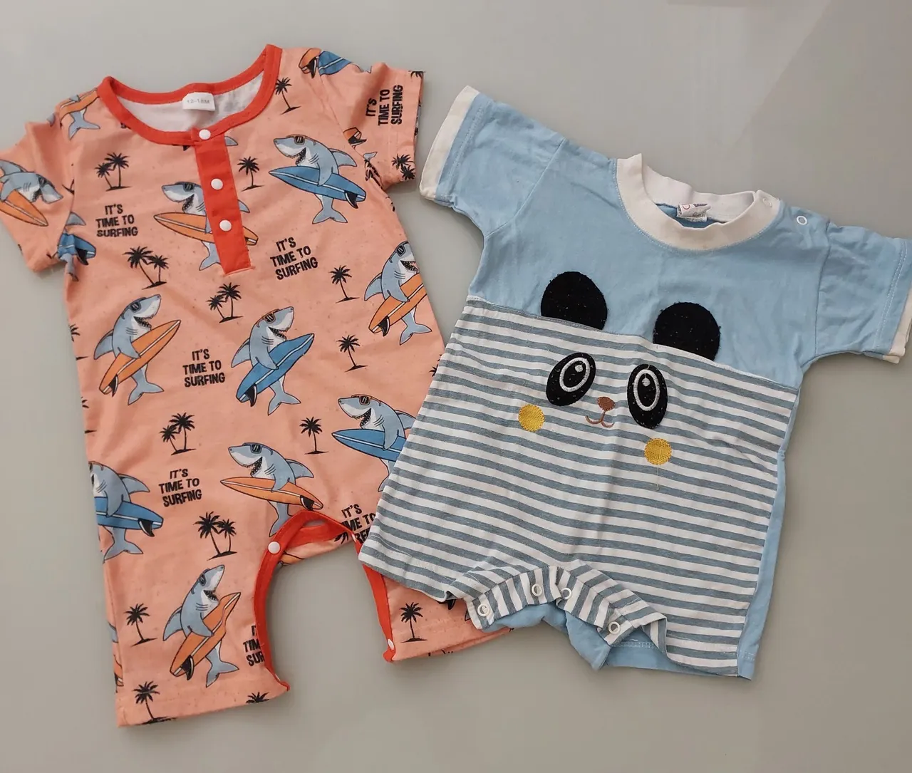 Macacões de bebê: tubarão e panda