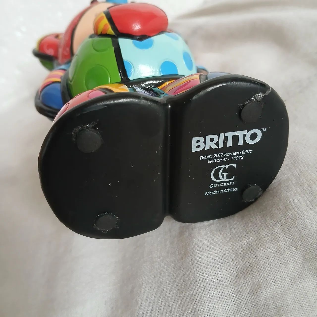 Estatueta Romero Britto 434735930242519044