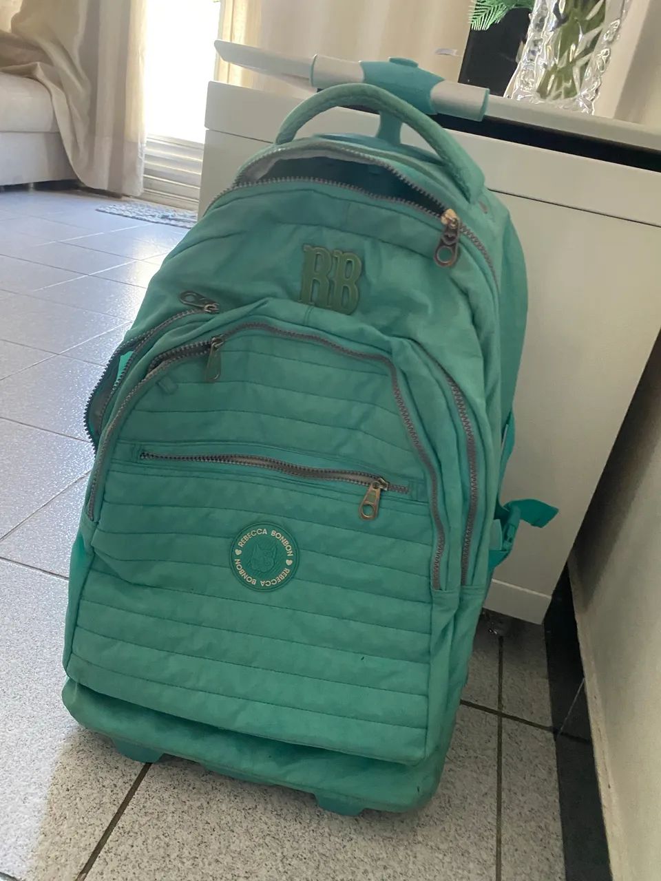 Mochila carrinho Rebeca bombom 