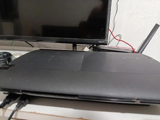 Ps3 com duas Manetes , e 60 jogos  - Foto 2