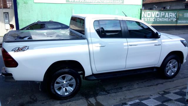 Hilux srv aut DIESEL 2018 zerada !!! - Foto 12