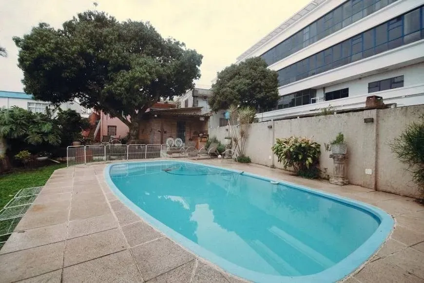 Casa 4 dormitórios no Santa Teresa