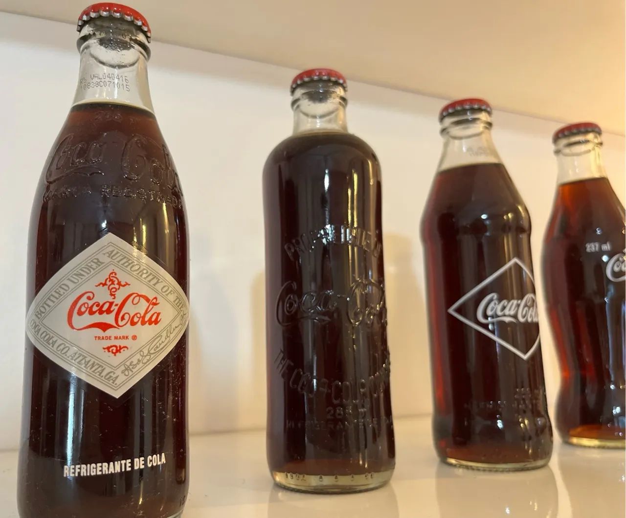 Coleção histórica Coca-Cola - 6 garrafas vintage originais (1899 a 1923)