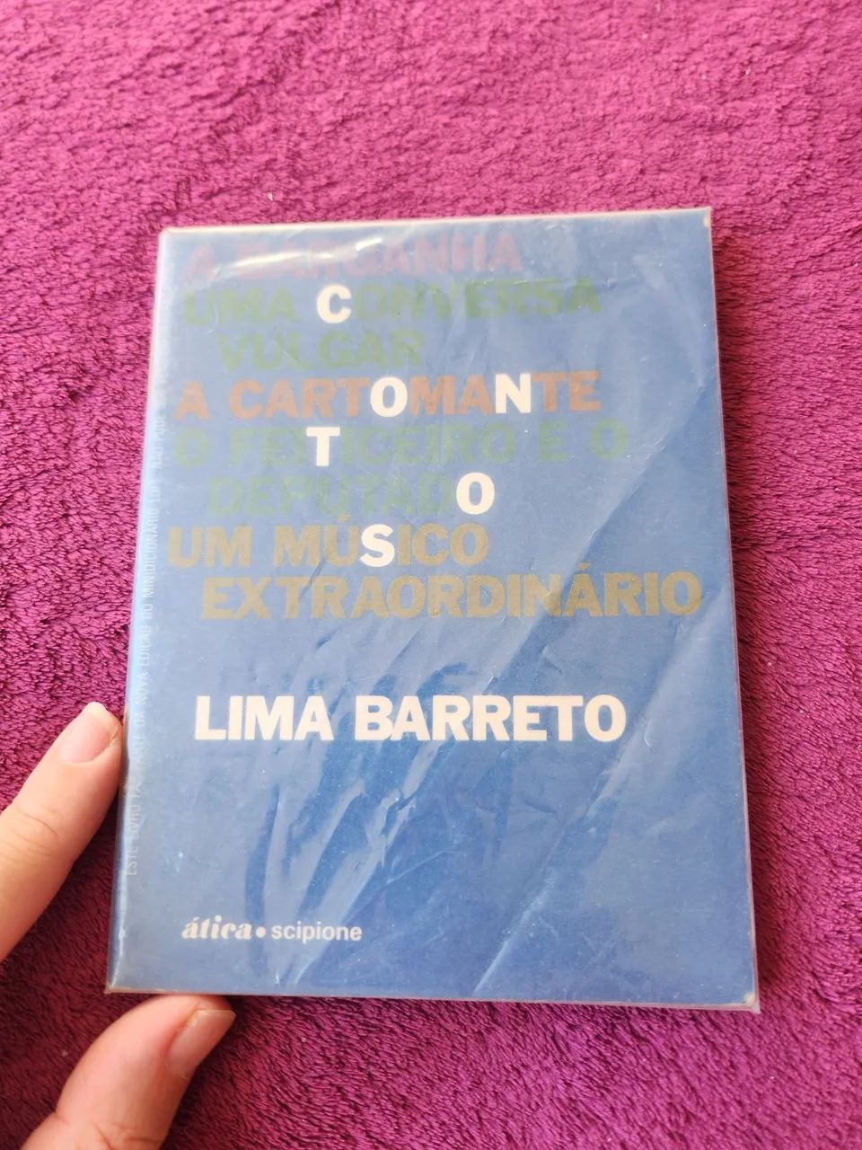 Livro a barganha uma conversa vulgar a cartomante o feiticeiro e o músico extraordinário 