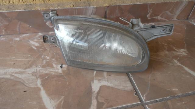 Farol direito Hyundai akise 98