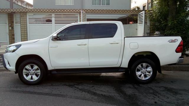 Hilux srv aut DIESEL 2018 zerada !!! - Foto 11