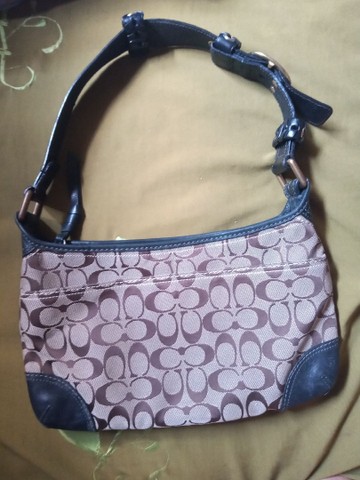 coach bolsa with purple strap