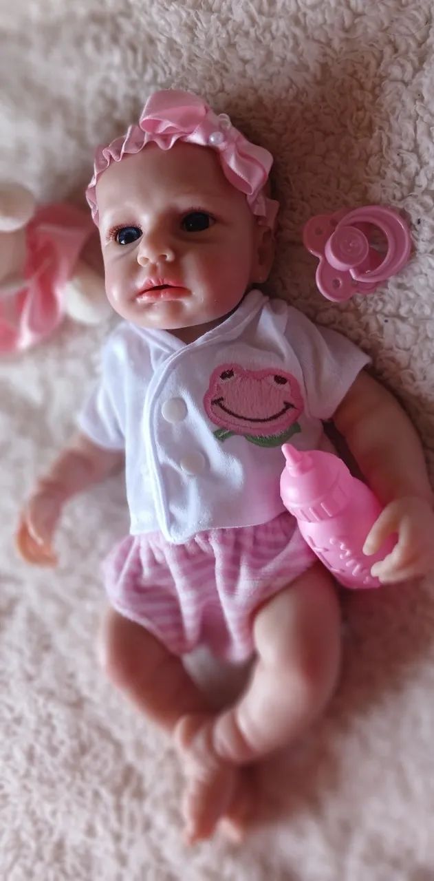 Boneca Reborn Toda  de Silicone Sólido 35 cm. - Foto 4