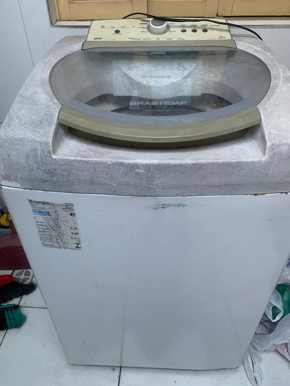 Máquina de lavar com defeito 