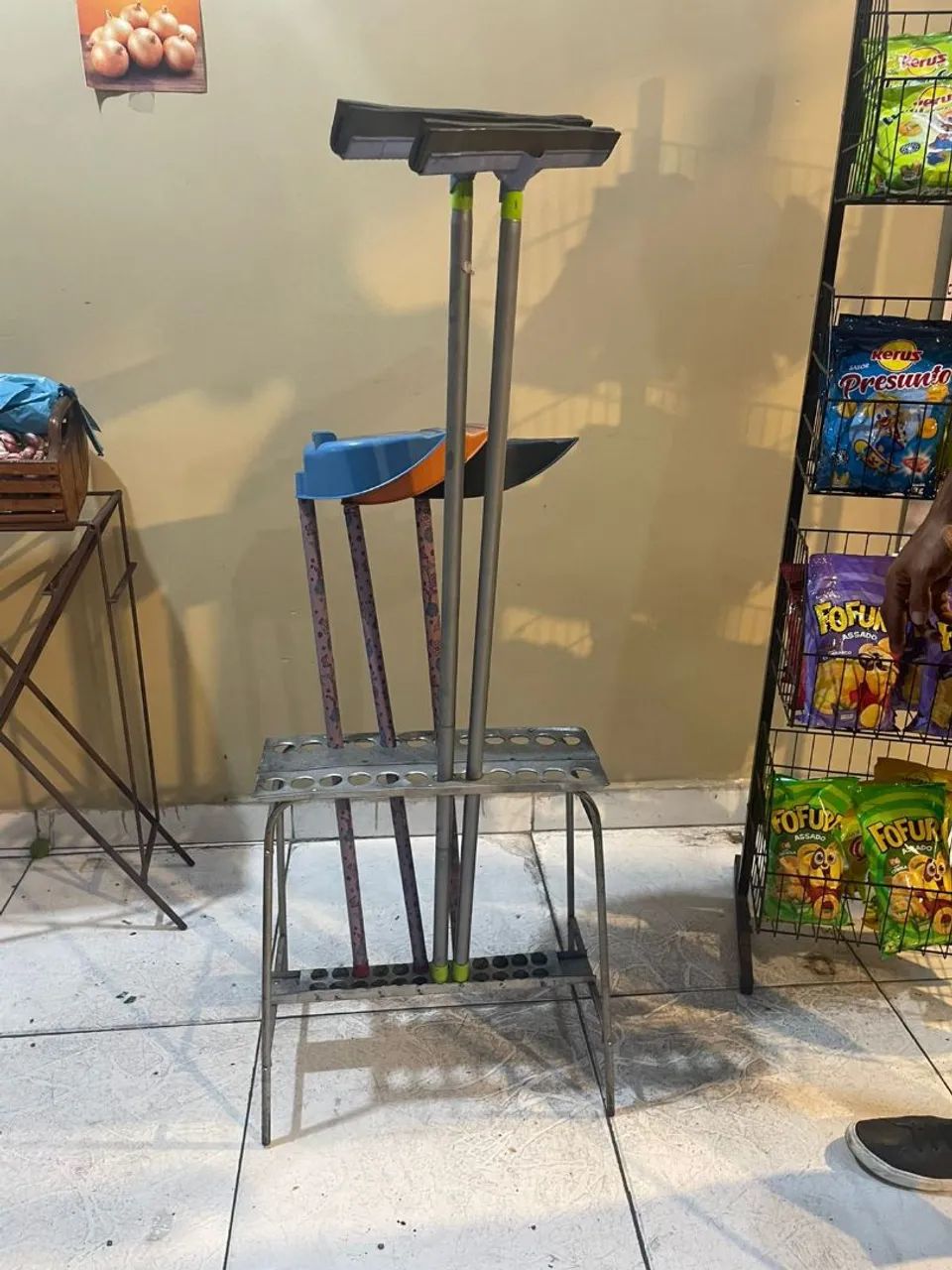 Expositor de vasouras