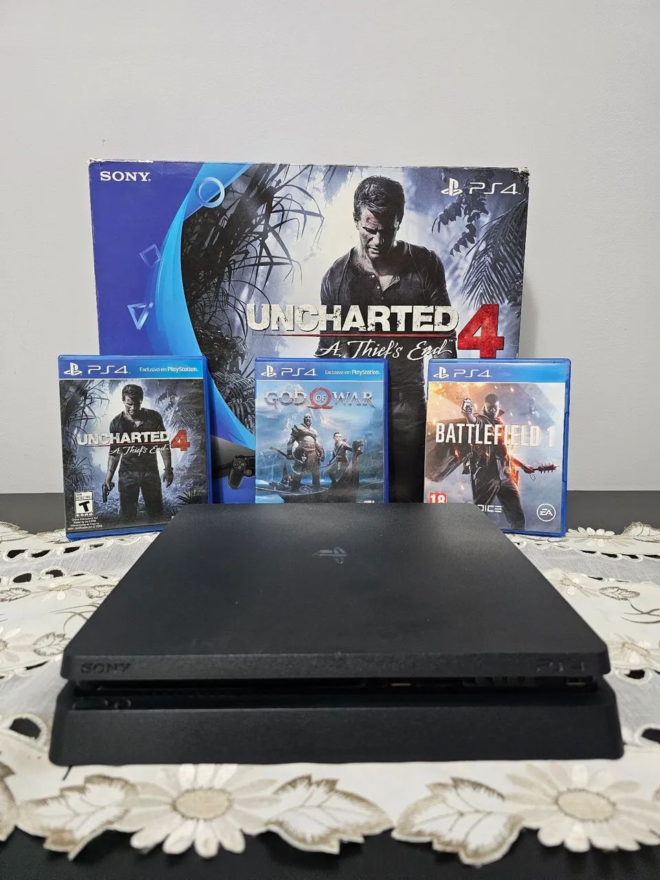 PS4 Slim com jogos