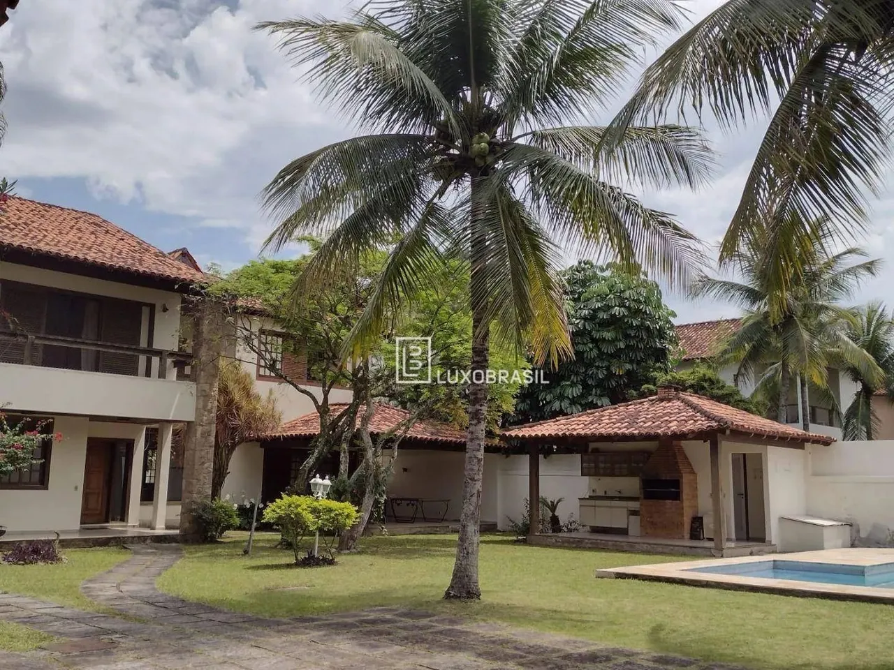 Casa com 4 dormitórios à venda, 656 m² por R$ 5.500.000,00 - Barra da Tijuca - Rio de Jane