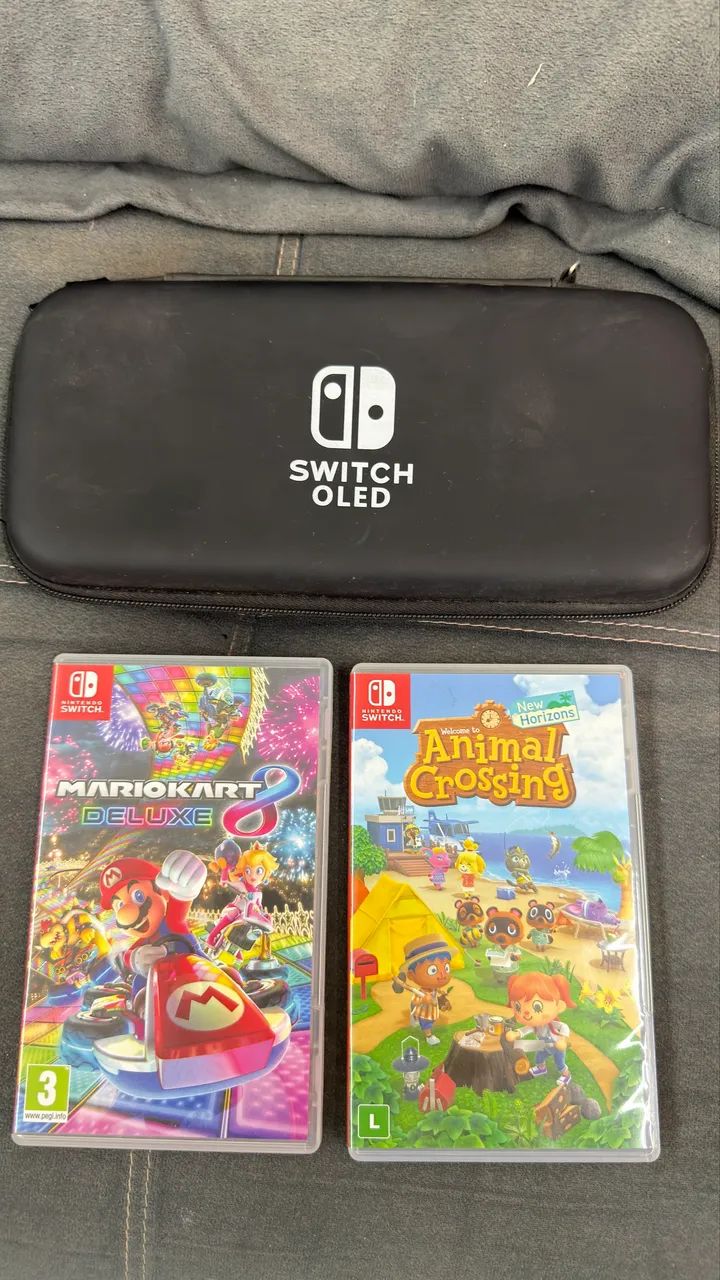 Nintendo Switch OLED + 2 Jogos - Foto 3