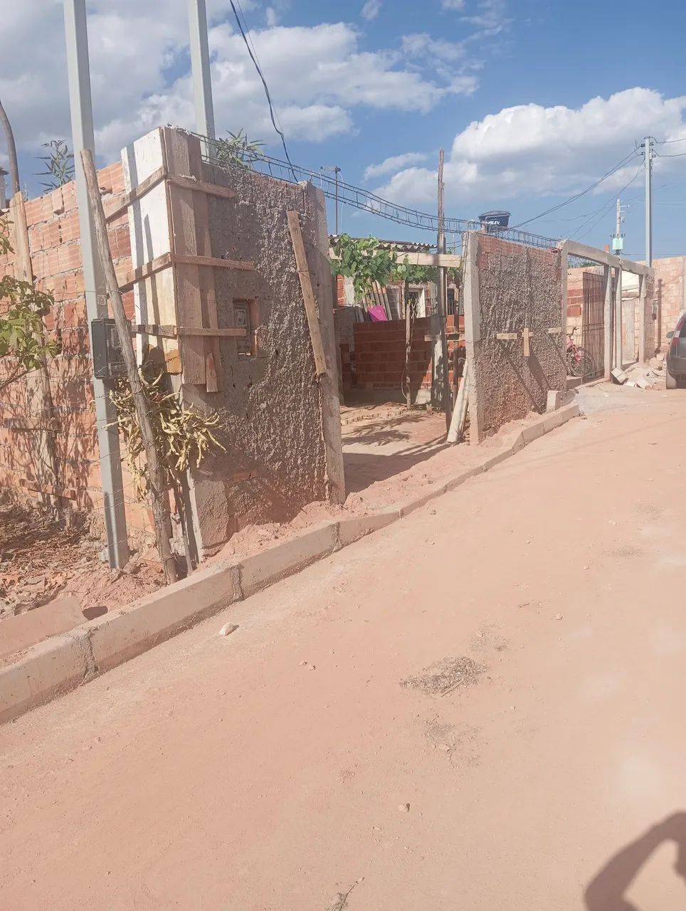 Lote com casa