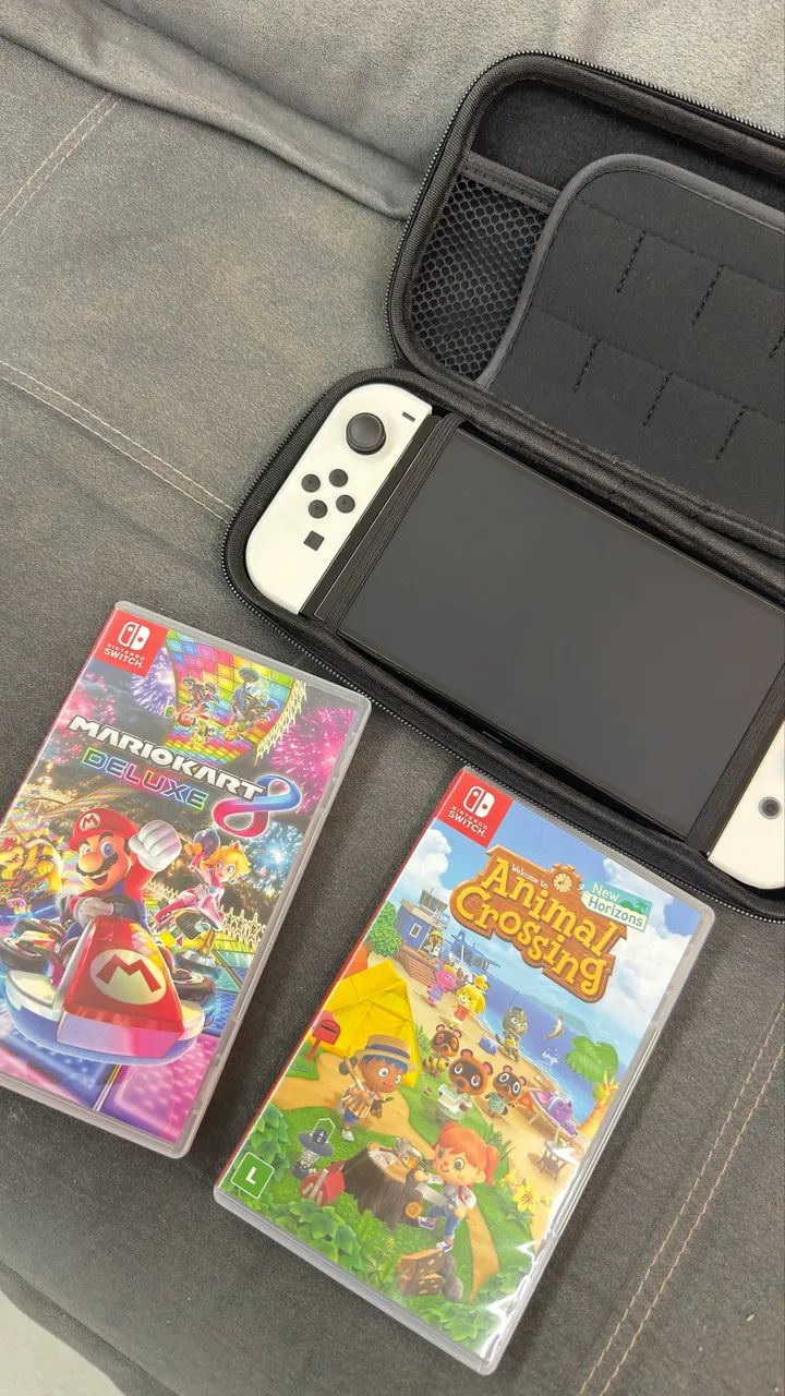 Nintendo Switch OLED + 2 Jogos - Foto 4
