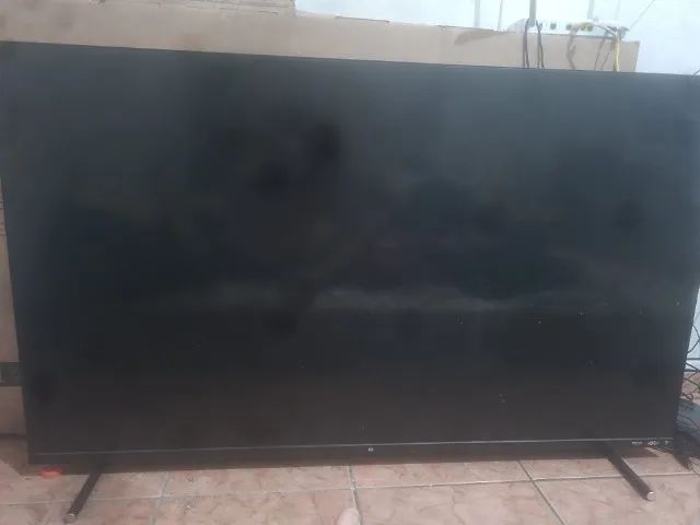 TV Multi 4K 55 pol com caixa em excelente estado.