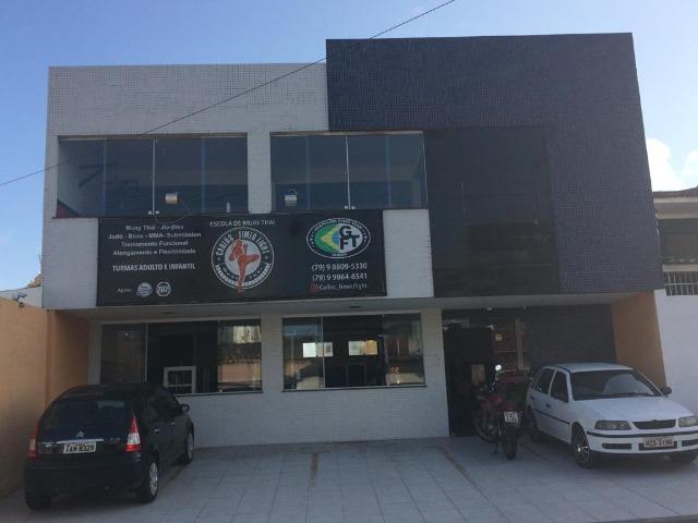 Casa a venda com comércio no Bairro Luzia