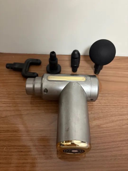 Pistola massageadora