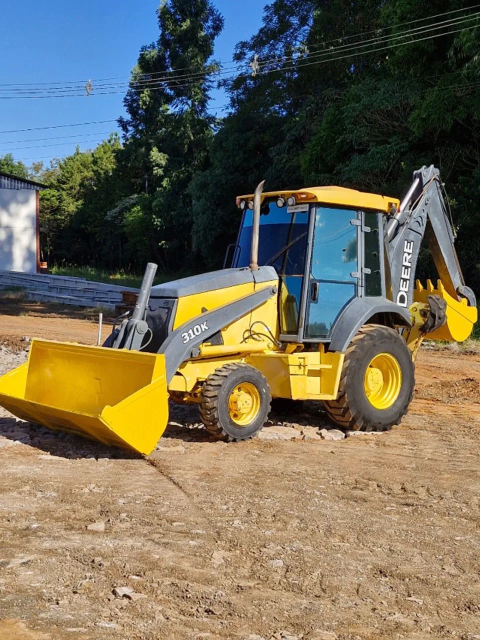 Retro Escavadeira John Deere 310k ano 2015 tração 4x4 com 6000 horas 
