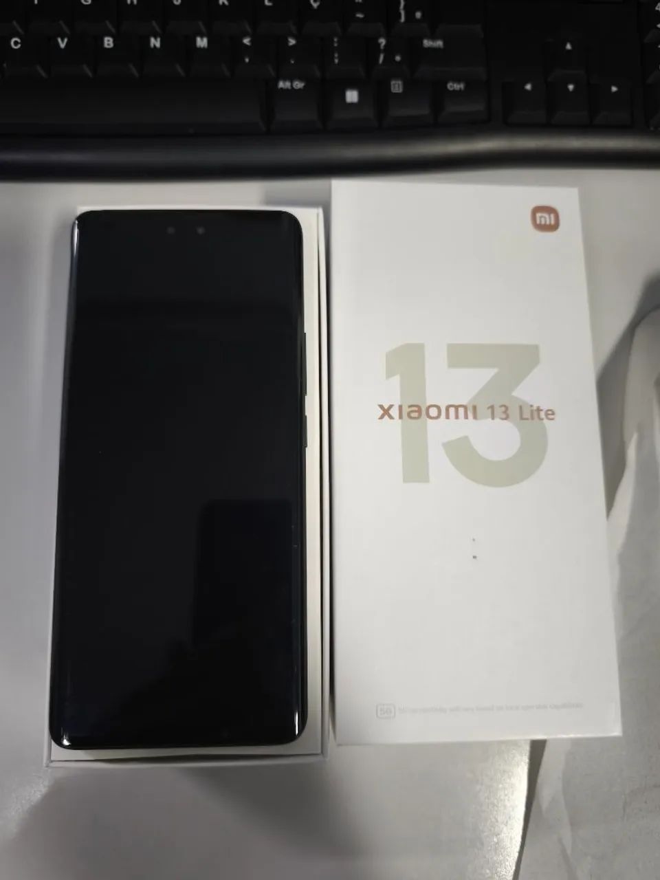Celular Xiaomi 13 lite 8Ram 256GB ( impecável 