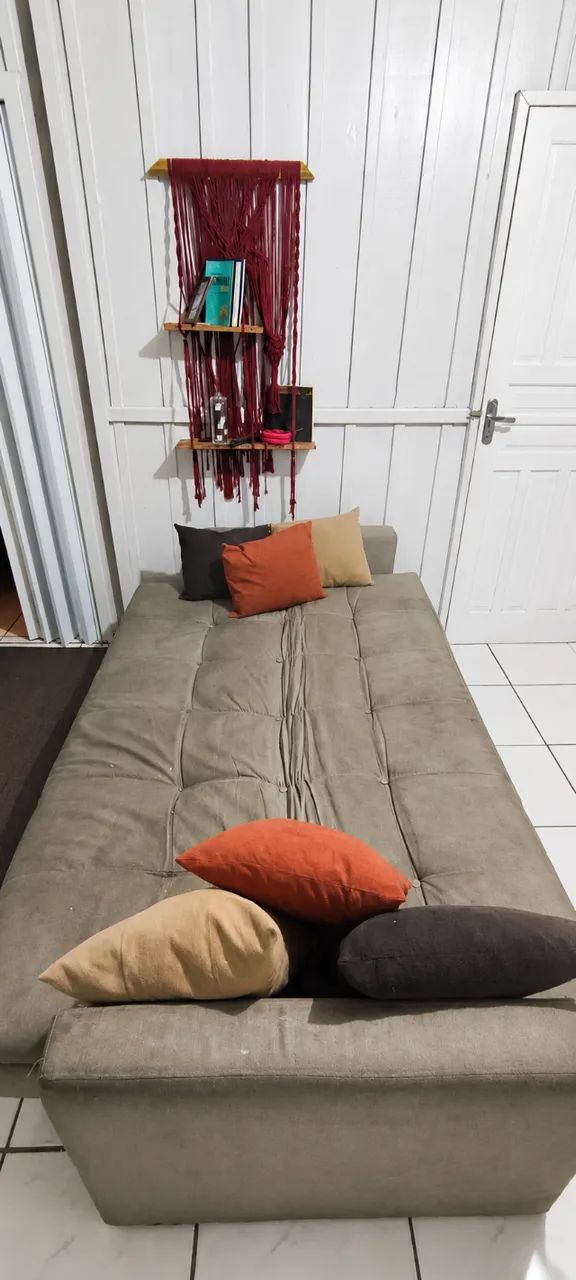 Sofá-cama + jogo de almofadas