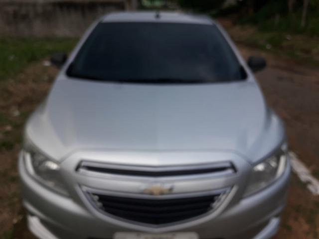 Ônix LT 1.0 2014 Flex prata, dir hidráulica, vidro e trava elétrica, som, ar, 77km