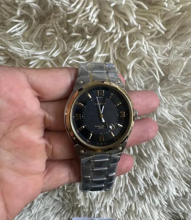Orient prata com dourado- original, prova dágua e com garantia da autorizada 